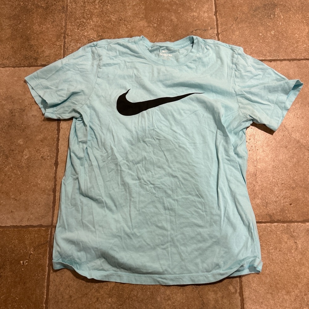 Baby blue Nike shirt